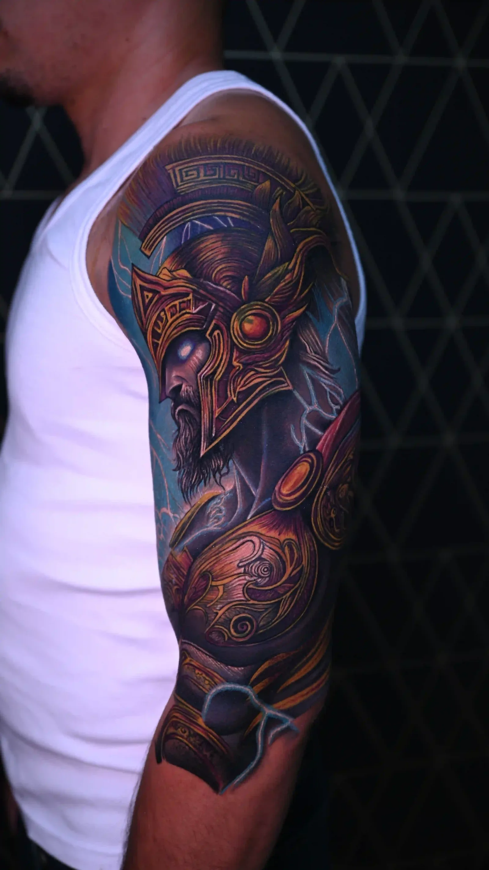 Color realism upper-arm sleeve of an oni samurai warrior with glowing eyes and ornate armor by Danyi at Shadow Studio Charlotte