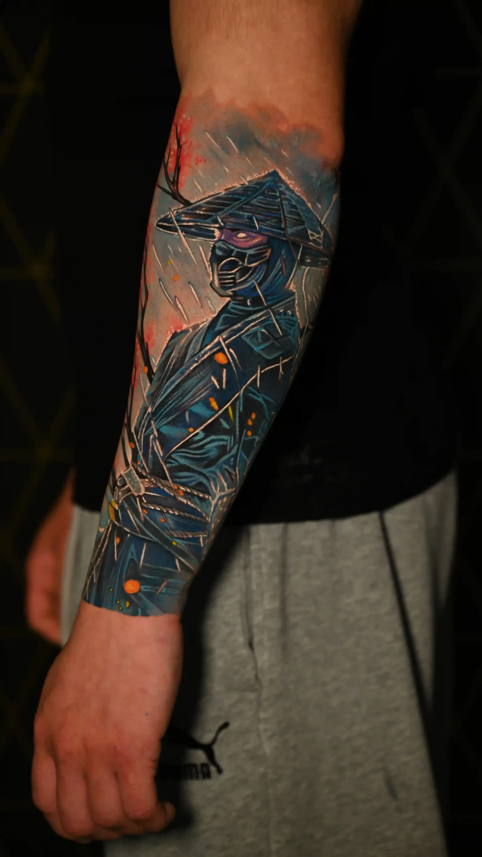 Color realism forearm sleeve of a samurai scarecrow with red eyes by Danyi at Shadow Studio Charlotte